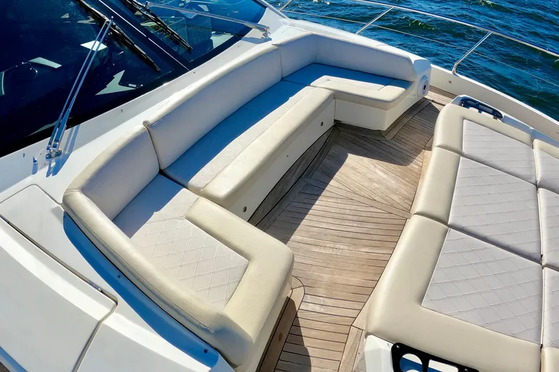  Yacht Photos Pics Luxurious seating on 2016 Absolute 72 FLY yacht with elegant wood deck.