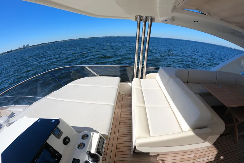 Yacht Photos Pics Luxurious 2016 Absolute 72 FLY yacht deck with ocean view and comfortable seating.