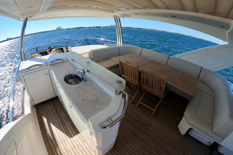  Yacht Photos Pics Luxurious 2016 Absolute 72 FLY yacht interior with seating and ocean view.