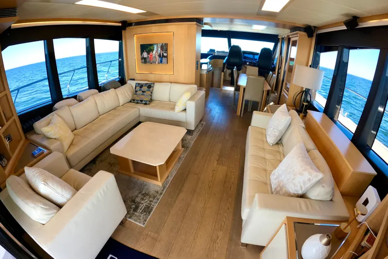  Yacht Photos Pics Luxurious interior of 2016 Absolute 72 FLY yacht with elegant seating and ocean view.