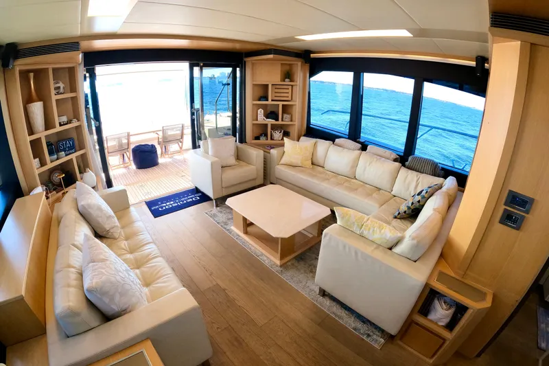  Yacht Photos Pics Luxurious interior of 2016 Absolute 72 FLY yacht with elegant seating and ocean view.