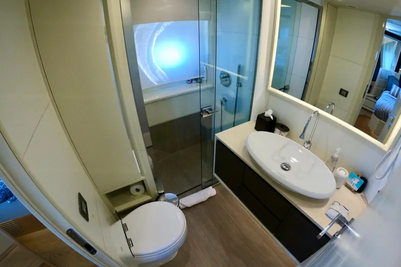  Yacht Photos Pics Luxurious bathroom in 2016 Absolute 72 FLY yacht with modern fixtures and elegant design.