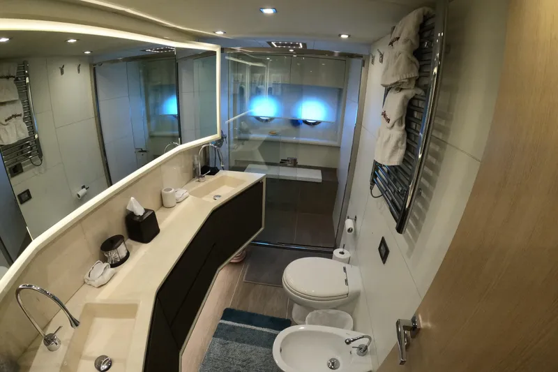  Yacht Photos Pics Luxurious bathroom in 2016 Absolute 72 FLY yacht with modern fixtures and elegant design.