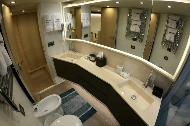  Yacht Photos Pics Luxurious bathroom interior on a 2016 Absolute 72 FLY yacht, featuring modern fixtures and elegant design.
