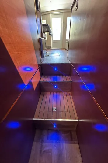  Yacht Photos Pics Staircase with blue LED lights inside a 1985 Bertram 46 Convertible yacht.