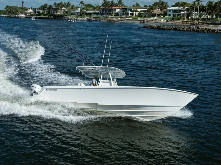 Baker Acted Yacht Photos Pics 2020 Contender 35ST boat cruising on a coastal waterway.