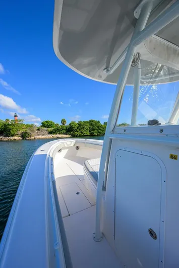 Baker Acted Yacht Photos Pics 2020 Contender 35ST boat on water with clear blue sky.