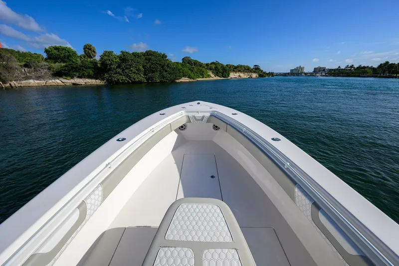 Baker Acted Yacht Photos Pics 2020 Contender 35ST boat cruising on a scenic waterway.