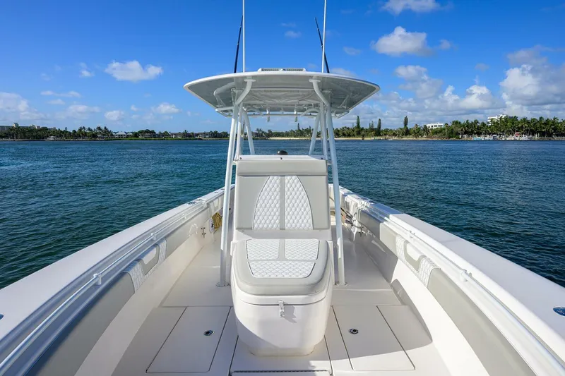 Baker Acted Yacht Photos Pics 2020 Contender 35ST boat on calm waters with clear blue sky.