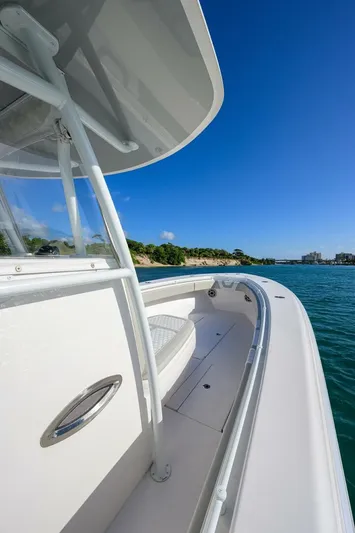 Baker Acted Yacht Photos Pics 2020 Contender 35ST boat on clear blue water.