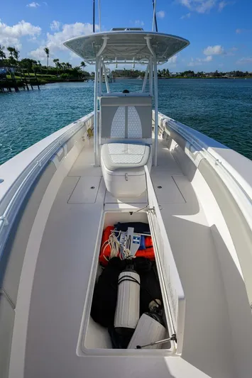 Baker Acted Yacht Photos Pics 2020 Contender 35ST boat with open storage compartment on deck.