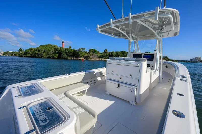 Baker Acted Yacht Photos Pics 2020 Contender 35ST boat on water with clear blue sky.