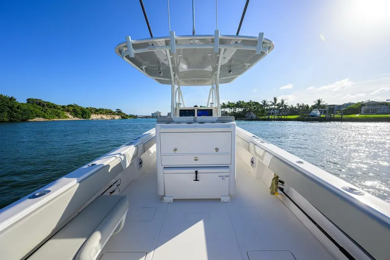 Baker Acted Yacht Photos Pics 2020 Contender 35ST boat on a sunny day, cruising on a scenic waterway.