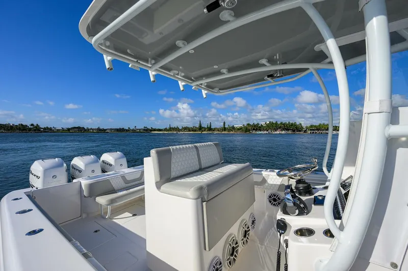 Baker Acted Yacht Photos Pics 2020 Contender 35ST boat interior with seating and ocean view.