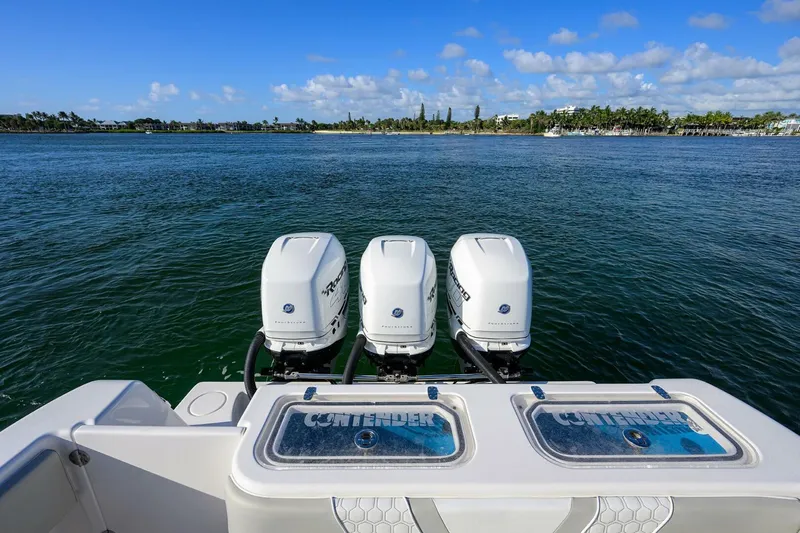 Baker Acted Yacht Photos Pics 2020 Contender 35ST boat with triple outboard engines on the water.