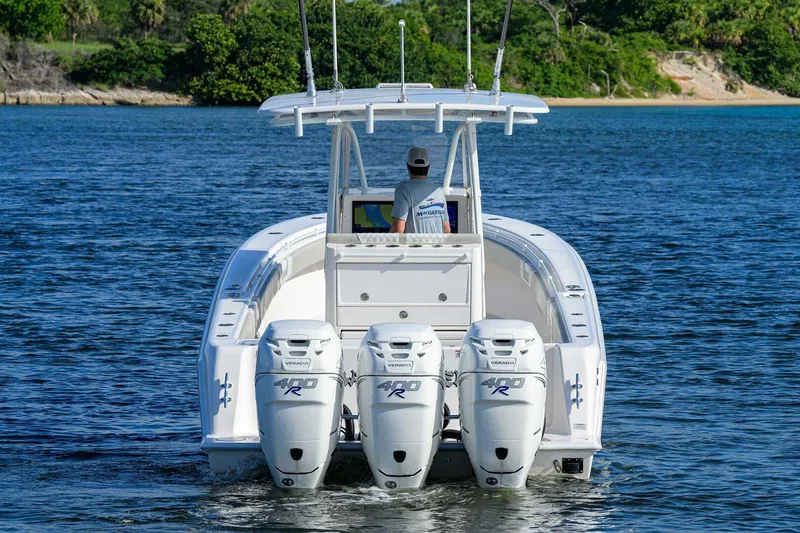 Baker Acted Yacht Photos Pics 2020 Contender 35ST boat with triple outboard engines on the water.