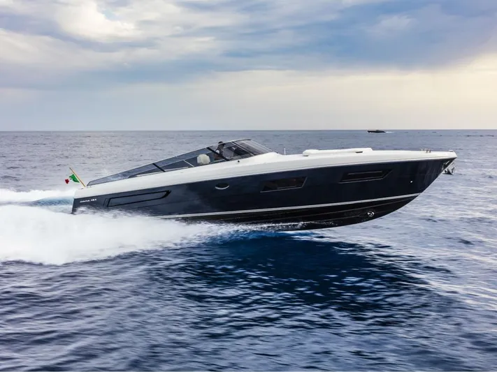  Yacht Photos Pics Itama 45 S 2021 yacht cruising on open sea under cloudy sky.