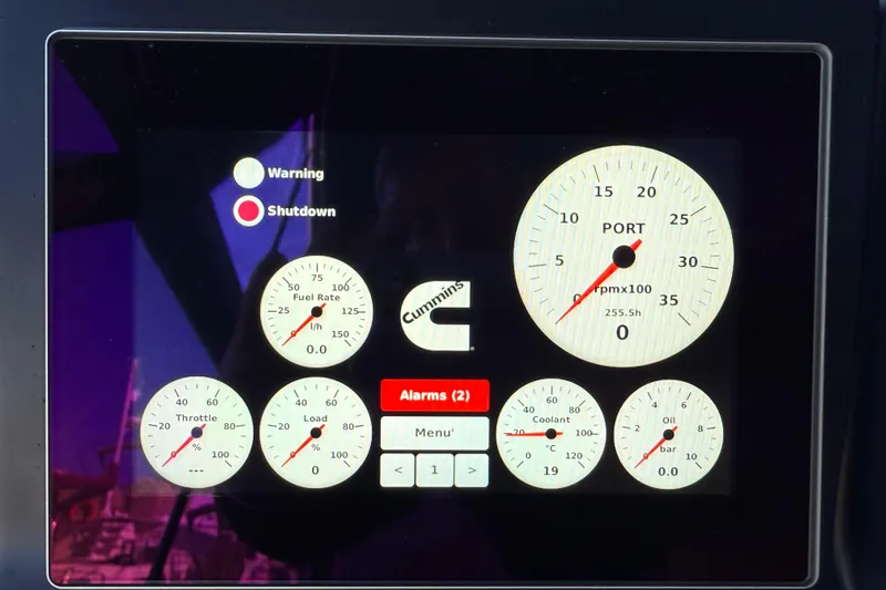  Yacht Photos Pics Dashboard of a 2021 Itama 45 S yacht showing engine gauges and alarms.