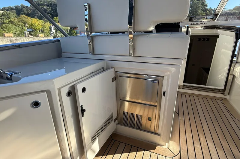  Yacht Photos Pics Luxury Itama 45 S yacht interior with sleek cabinetry and modern appliances, 2021 model.