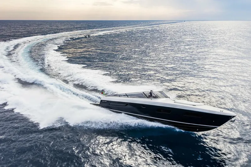  Yacht Photos Pics Itama 45 S yacht cruising swiftly on open sea, 2021 model.