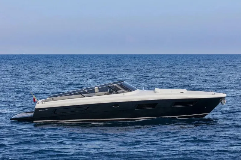  Yacht Photos Pics Itama 45 S 2021 yacht cruising on open sea under clear sky.