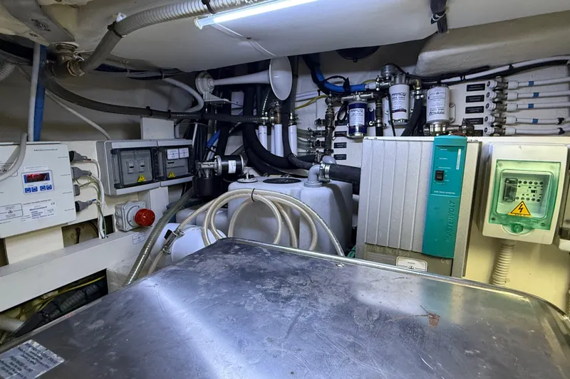  Yacht Photos Pics Engine room of 2021 Itama 45 S yacht with electrical and mechanical components.