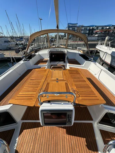 Dharma Yacht Photos Pics 2013 Jeanneau 57 yacht with spacious teak deck and modern cockpit.