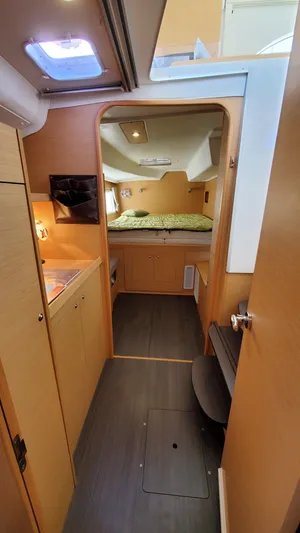 Blue Mind Yacht Photos Pics Interior of 2018 Lagoon 380 S2 catamaran, featuring cozy cabin and modern wood finish.