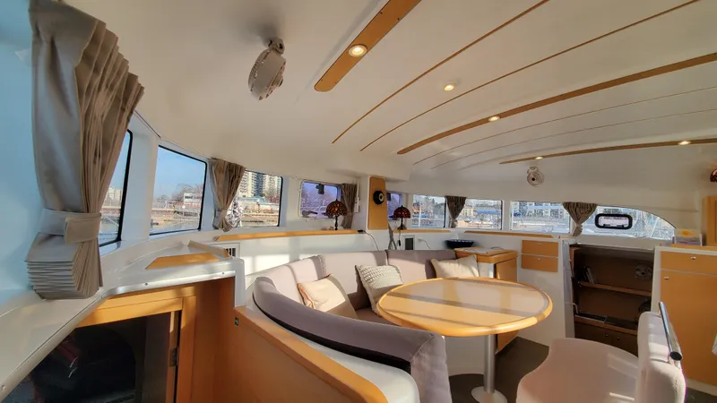 Blue Mind Yacht Photos Pics Interior of 2018 Lagoon 380 S2 catamaran with spacious seating and modern design.