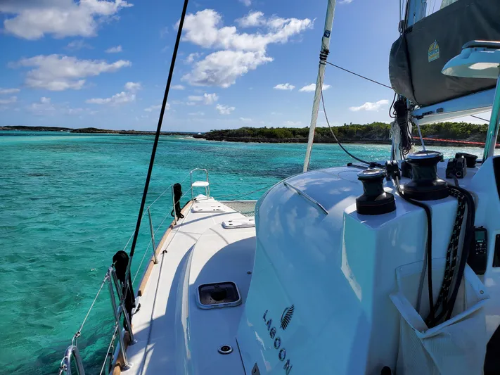 Blue Mind Yacht Photos Pics Lagoon 380 S2 sailing in clear turquoise waters, 2018 model.