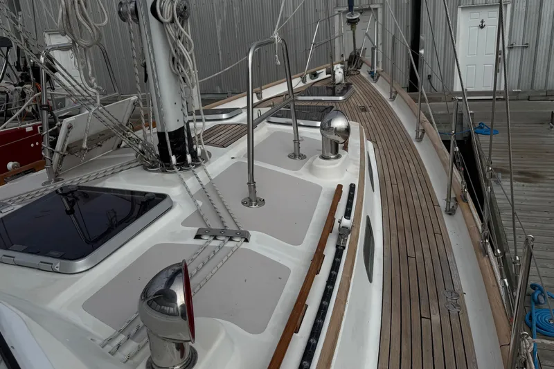 Ganache II Yacht Photos Pics 1985 Liberty 458 sailboat deck with wooden finish and rigging details.
