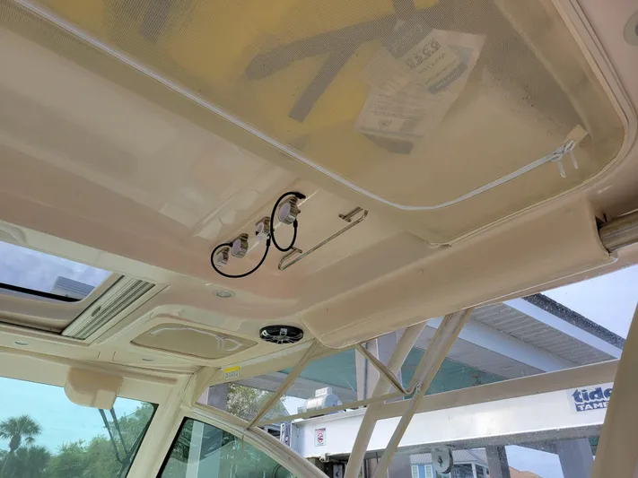  Yacht Photos Pics 2022 Grady-White Express 370 boat interior ceiling with storage compartments.
