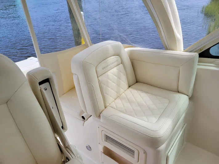  Yacht Photos Pics Luxury seating on 2022 Grady-White Express 370 boat, featuring elegant cream upholstery.