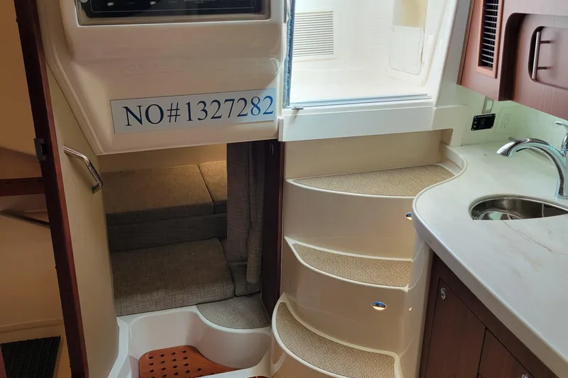  Yacht Photos Pics Interior of 2022 Grady-White Express 370 boat with stairs and sink.