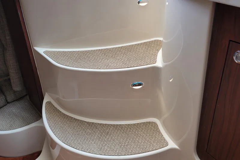 Yacht Photos Pics Interior steps of 2022 Grady-White Express 370 boat with carpeted treads.