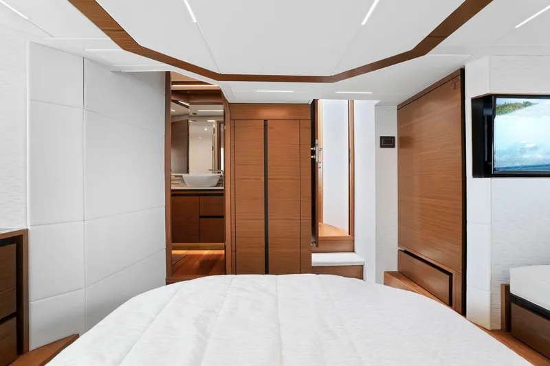 Seeker Yacht Photos Pics Luxurious interior of 2023 Tiara Yachts C49 Coupe, featuring modern design and elegant wood finishes.