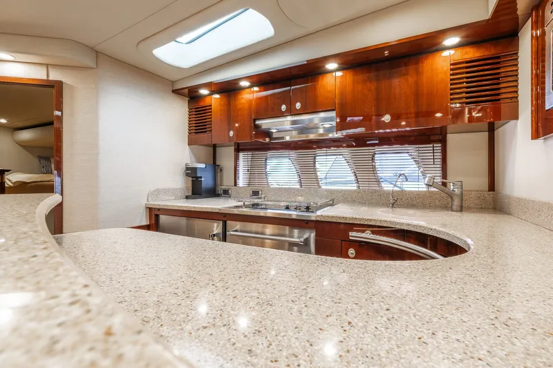  Yacht Photos Pics Luxurious kitchen interior of 2008 Sea Ray 60 Sundancer yacht with modern amenities.