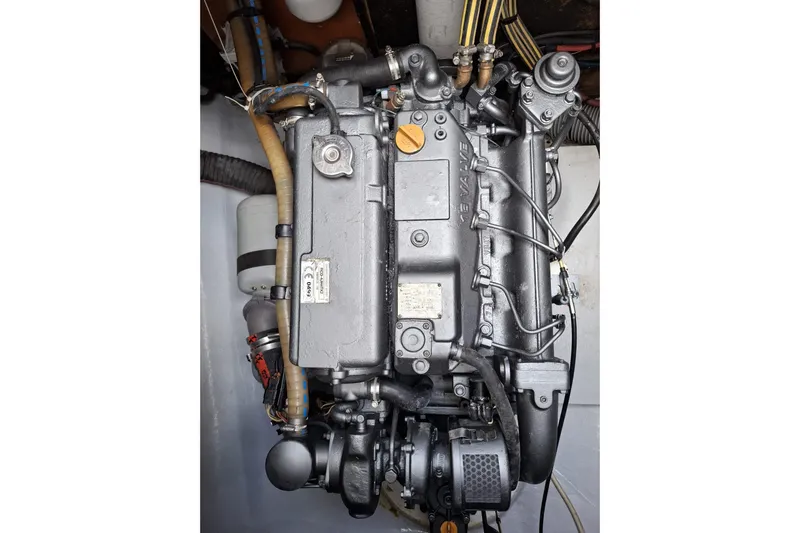  Yacht Photos Pics Engine of a 2010 Lagoon 500 catamaran, showcasing intricate mechanical components.