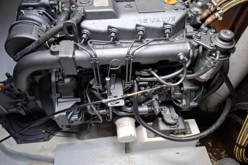  Yacht Photos Pics Engine of a 2010 Lagoon 500 catamaran, showcasing intricate mechanical components and 16-valve design.