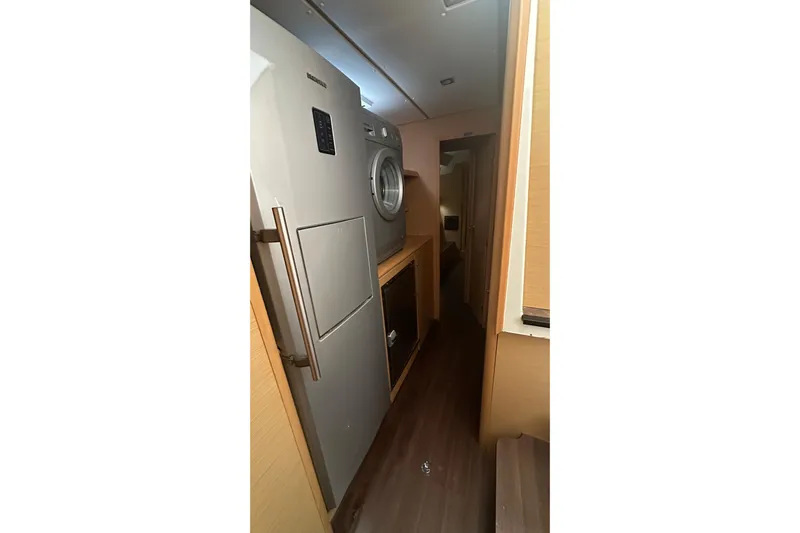  Yacht Photos Pics Interior of 2010 Lagoon 500 yacht with modern appliances and wood flooring.