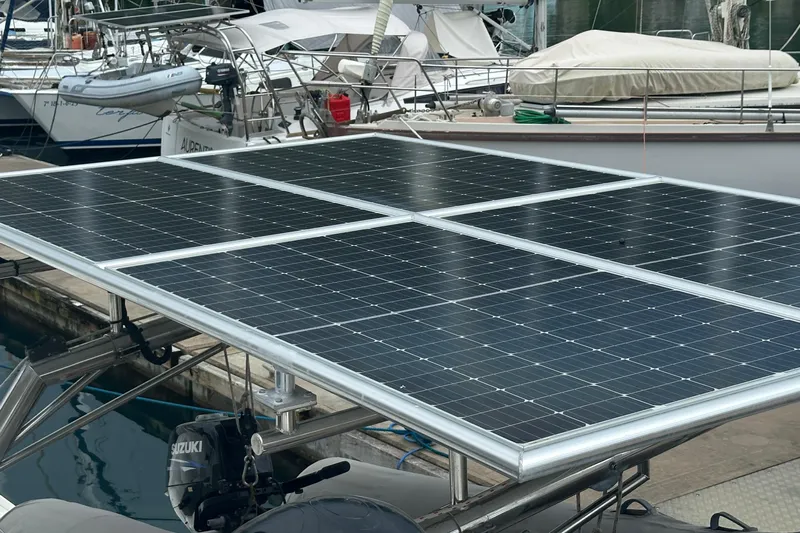  Yacht Photos Pics Solar panels on a 2010 Lagoon 500 catamaran docked at a marina.