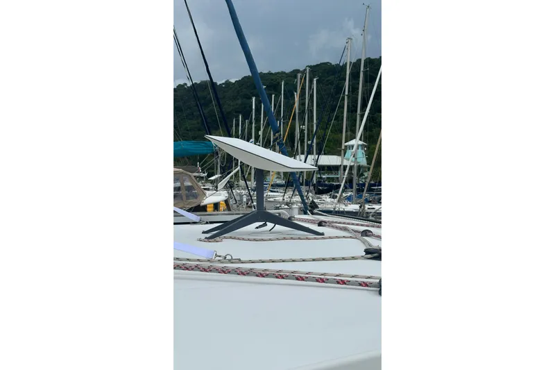  Yacht Photos Pics Lagoon 500 yacht with satellite dish, docked in marina, 2010 model.