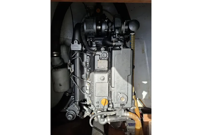  Yacht Photos Pics Engine of a 2010 Lagoon 500 catamaran, showcasing mechanical components and details.