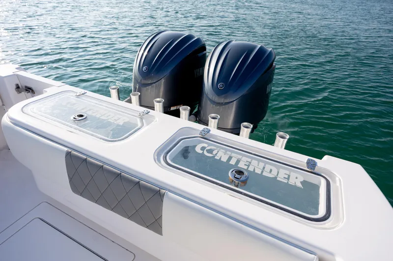  Yacht Photos Pics 2013 Contender 32 Tournament boat with dual Yamaha engines on the water.