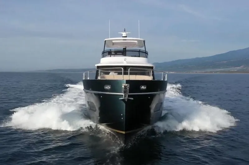  Yacht Photos Pics 2025 Azimut 60 Magellano yacht cruising on open water.