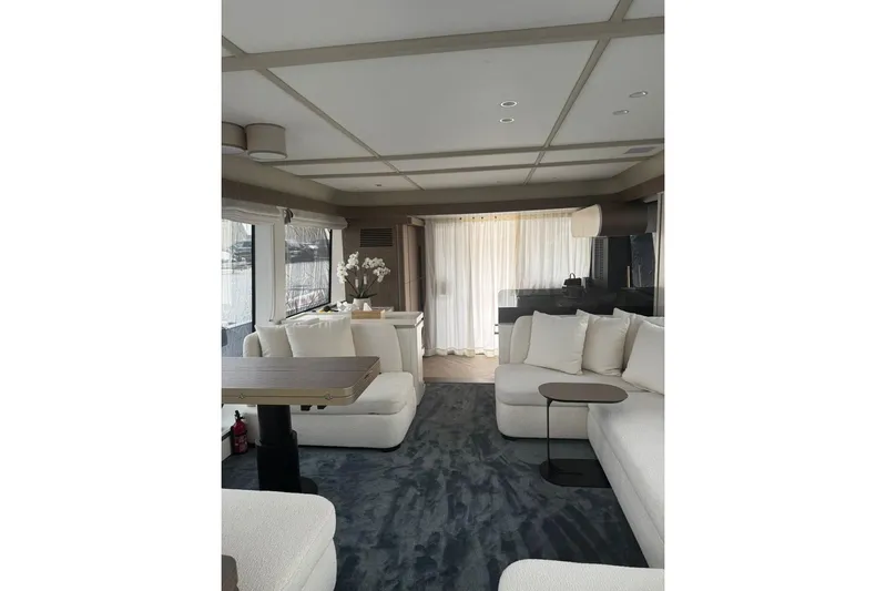  Yacht Photos Pics Luxurious interior of 2025 Azimut 60 Magellano yacht with elegant seating and modern decor.