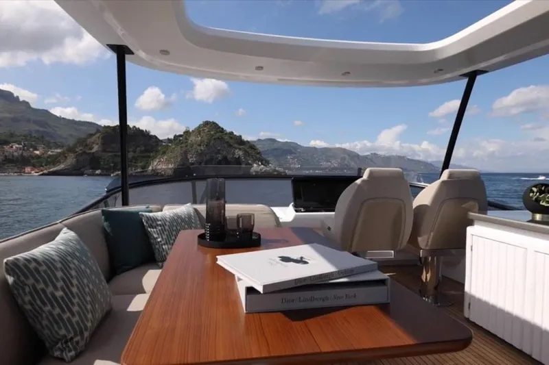  Yacht Photos Pics Luxurious interior of 2025 Azimut 60 Magellano yacht with scenic ocean view.