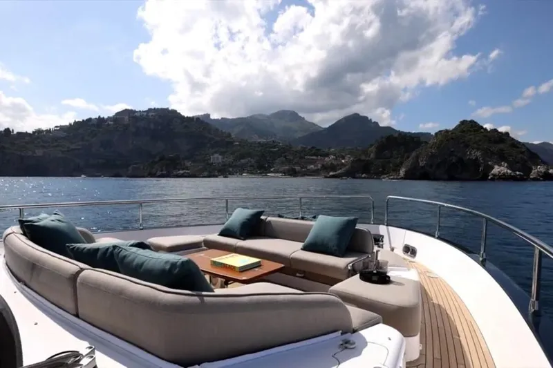  Yacht Photos Pics Luxurious 2025 Azimut 60 Magellano yacht with scenic ocean and mountain views.