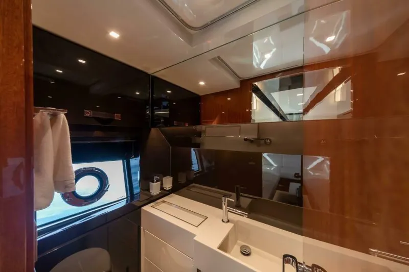 2021 Riva 56 Rivale &ldquo;grey&rdquo; Yacht Photos Pics Luxurious bathroom interior of 2021 Riva 56 yacht with modern fixtures and elegant design.