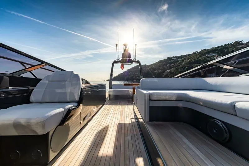 2021 Riva 56 Rivale &ldquo;grey&rdquo; Yacht Photos Pics Luxurious 2021 Riva 56 yacht deck with elegant seating and scenic ocean view.
